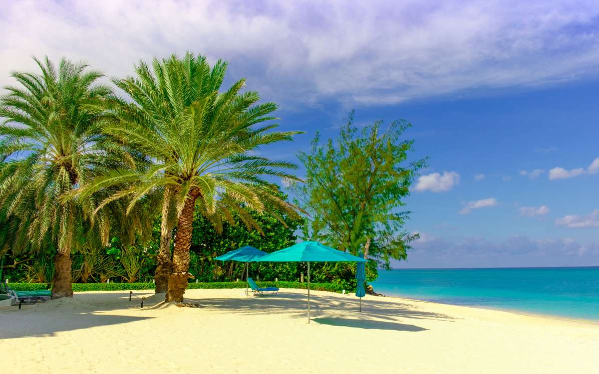These Cheap Flights to the Cayman Islands Come With Free Onboard ...