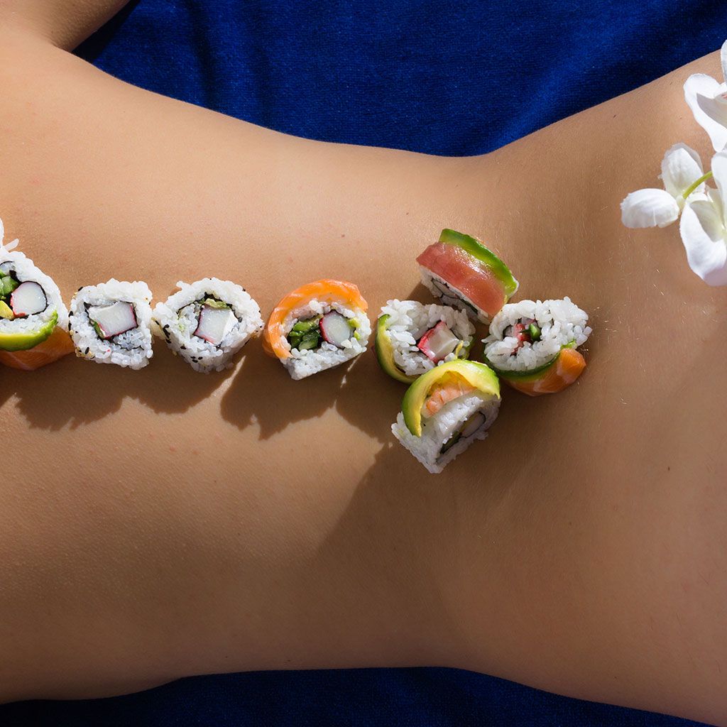 Eating sushi off a naked girl