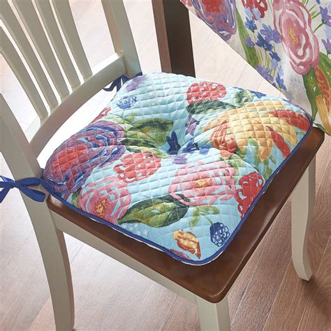 Vintage inspired and vibrant in color, spice up your kitchen with the pioneer woman flea market reversible chair pad pioneer woman cushions