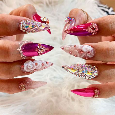 These fun and flirty pink valentine's day nails are perfect for making a statement and showing your love show off your style with these cute pink valentine's day nails