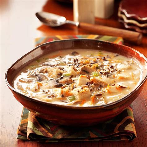 Put the chicken into a slow cooker along with the onions, celery, and carrots slow cooker chicken noodle soup creamy