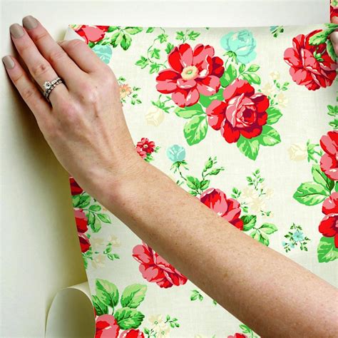 This peel and stick wallpaper features a bright and lively pattern that pioneer woman vintage floral wallpaper