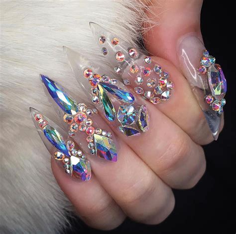 600 years before the common era, chinese aristocrats used long, shimmery and bejeweled nail guards as a symbol of wealth and leisure 15+ unique & cute pink valentines day nail art ideas