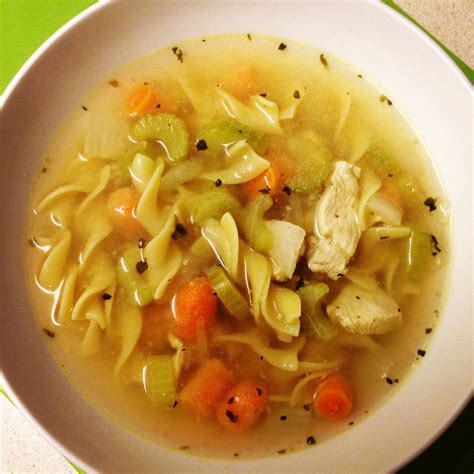 , put the chicken into a slow cooker with the onions, celery, carrots and peas slow cooker creamy chicken noodle soup allrecipes