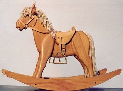 Below is the link to download a set of plans and a  wooden rocking horse woodworking plans