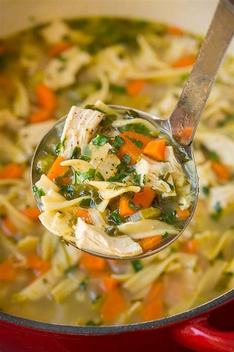 Put the chicken into a slow cooker along with the onions, celery, and carrots slow cooker chicken noodle soup creamy