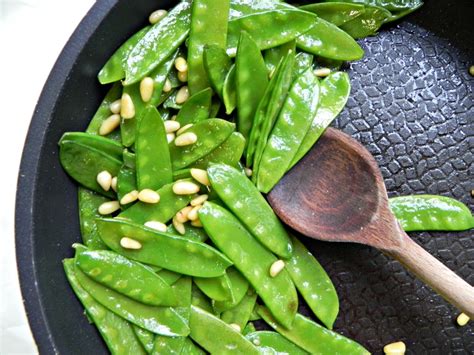 snow peas with pine nuts and mint