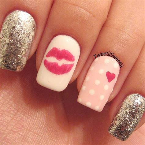 With tiny arcs of color along each nail's outer edge, this manicure is both  25 pretty pink nail ideas for valentine's day