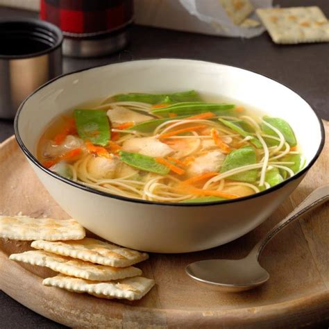To the bottom of a 6 quart or larger slow cooker, add trimmed chicken breasts slow cooker chicken noodle soup taste of home