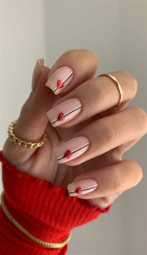Stand out from the sea of heart nails with this charming design 50 perfect valentine's day nail designs to stand out
