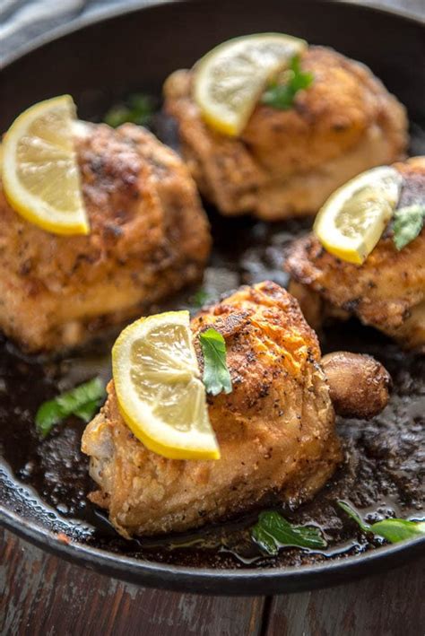 crispy curried chicken thighs with wilted greens