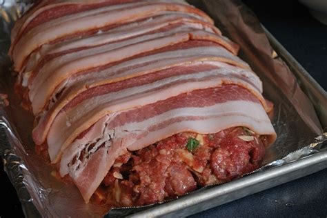 Drummond combines a mixture of ketchup, brown sugar, dry mustard, and tabasco sauce and pours a third of the sauce on the meatloaf then bakes it  pioneer woman bacon wrapped meatloaf