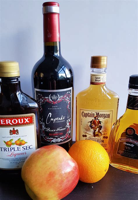 2 oranges, one sliced and one juiced, easy red wine sangria recipe