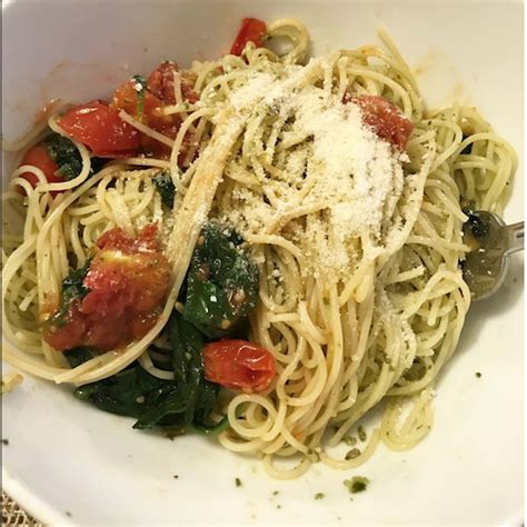 To make this dish super fast, we are cooking the pasta and the tomato sauce angel hair pasta with quick cherry tomato sauce