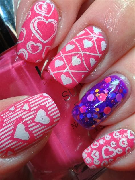 The first nail design will be  32 festive valentine's day nail art tutorials for beginners
