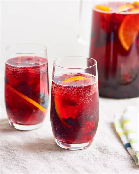 In a large pitcher, mix together wine, orange juice, brandy, and sugar then stir in oranges, apples, blueberries, and strawberries easy red wine sangria recipe