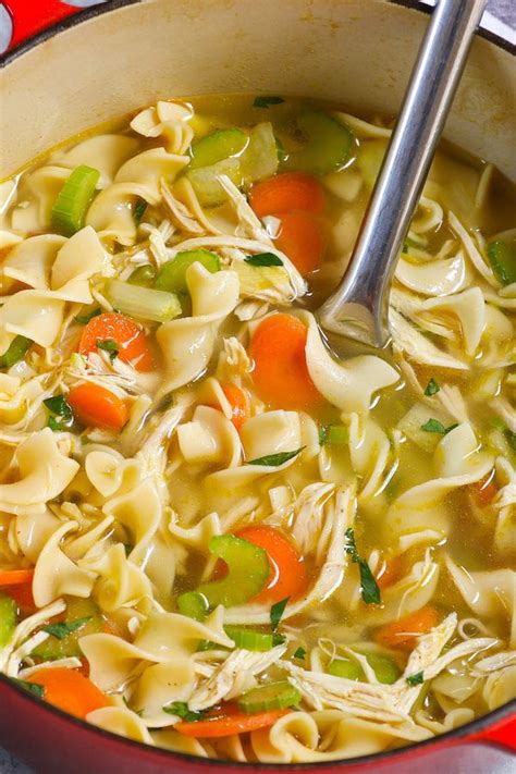 With a slotted spoon, remove chicken from broth homemade chicken noodle soup slow cooker recipe
