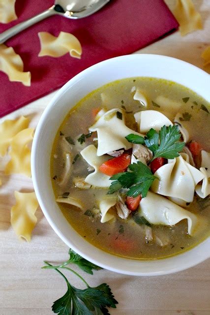 Ina garten uses rich homemade stock to make her chicken soup recipe from barefoot contessa on food network; homemade chicken noodle soup ina garten